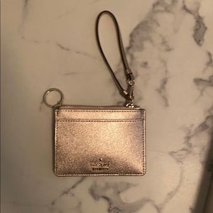 Cute Kate Spade wristlet !!! Rose gold